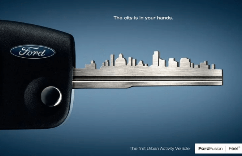 A Ford advertisement featuring a car key with a city skyline cut into it.